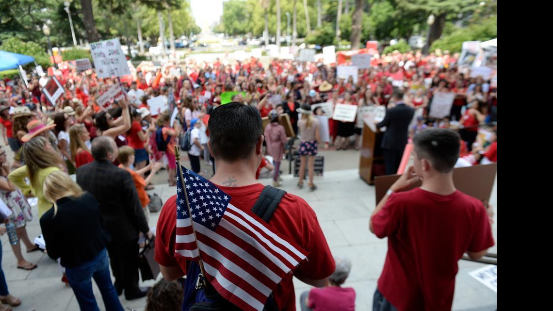 
Nicholas Johansen of Hayward joins a rally against Senate Bill 277, which would make vaccination a condition of enrollment in private and public schools, on the west steps of the Capitol on Tuesday.
