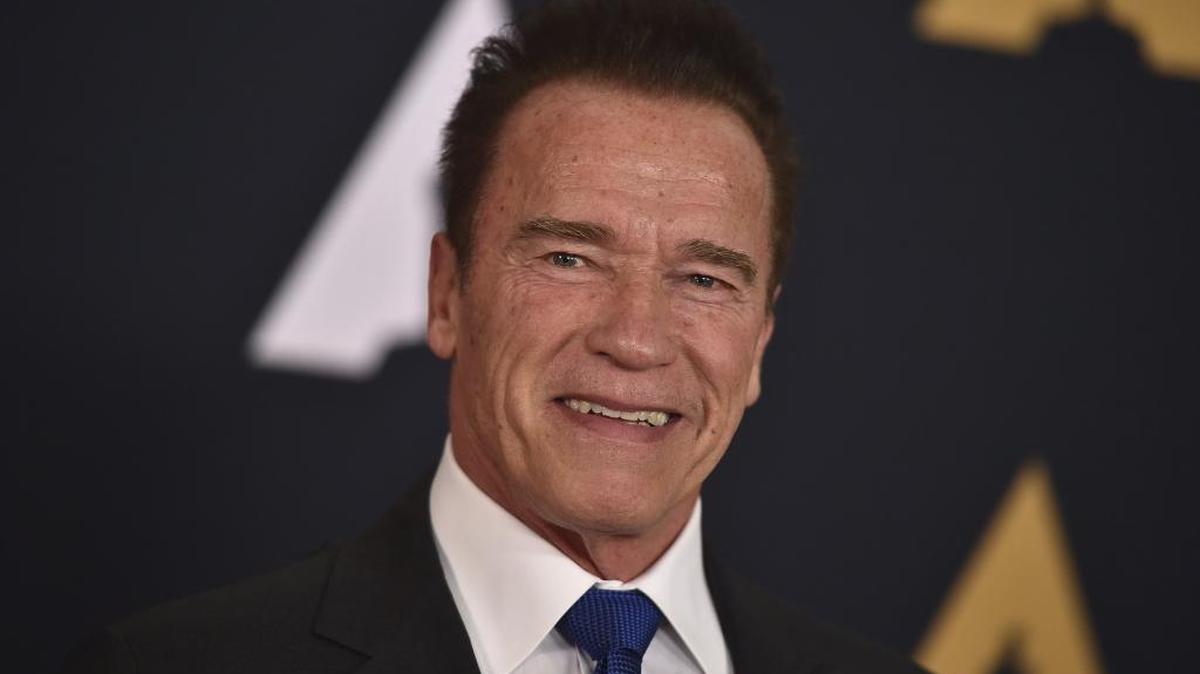 Arnold Schwarzenegger arrives at the 2016 Governors Awards in Los Angeles. Schwarzenegger and Donald Trump have spent months squabbling over ratings, both for public approval and for “The Celebrity Apprentice.” Now, amid Trump’s budget cuts, the former California governor is convening a national after-school summit Wednesday.