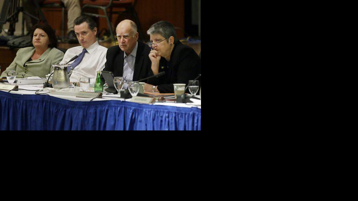 
Assembly Speaker Toni Atkins, Lt. Gov. Gavin Newsom, Gov. Jerry Brown, and University of California President Janet Napolitano listen to students speak during the UC Regents meeting in San Francisco on Nov. 20, 2014. 
