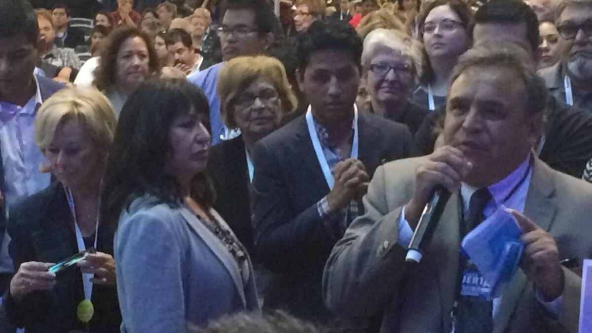 Emilio Huerta speaks on the floor of the California Democratic Party convention.