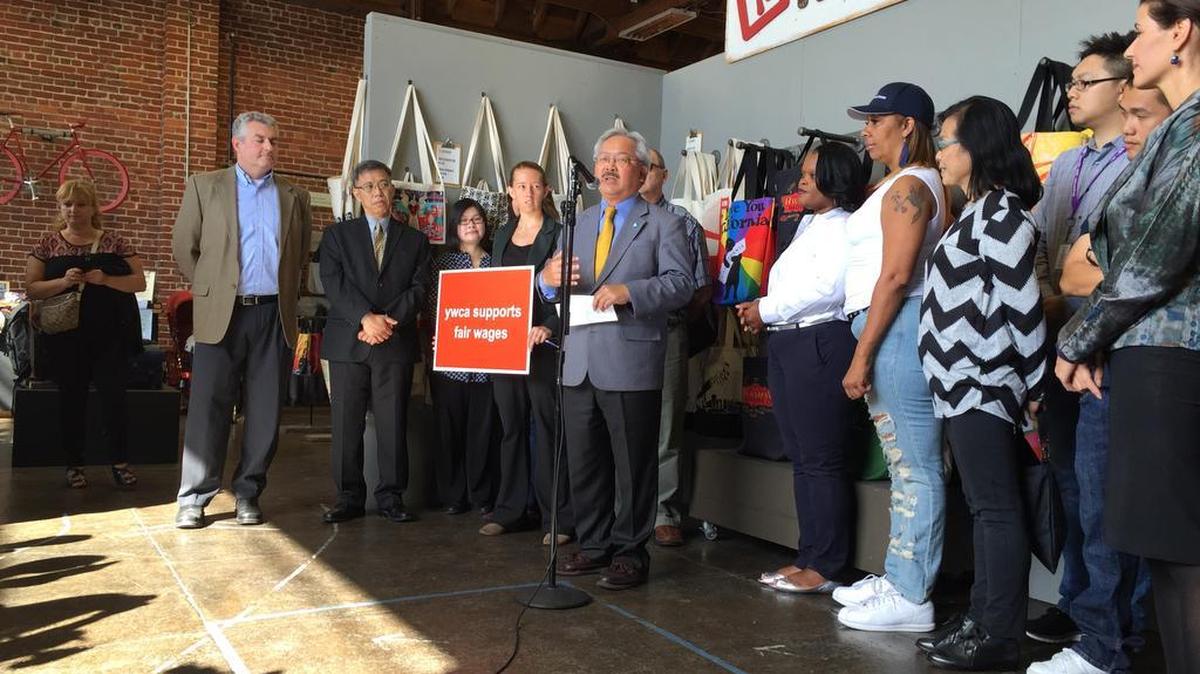 
San Francisco Mayor Ed Lee, speaking Tuesday at Rickshaw Bagworks, joins proponents of a statewide ballot measure to raise California’s minimum wage to $15 an hour from $10 an hour.
