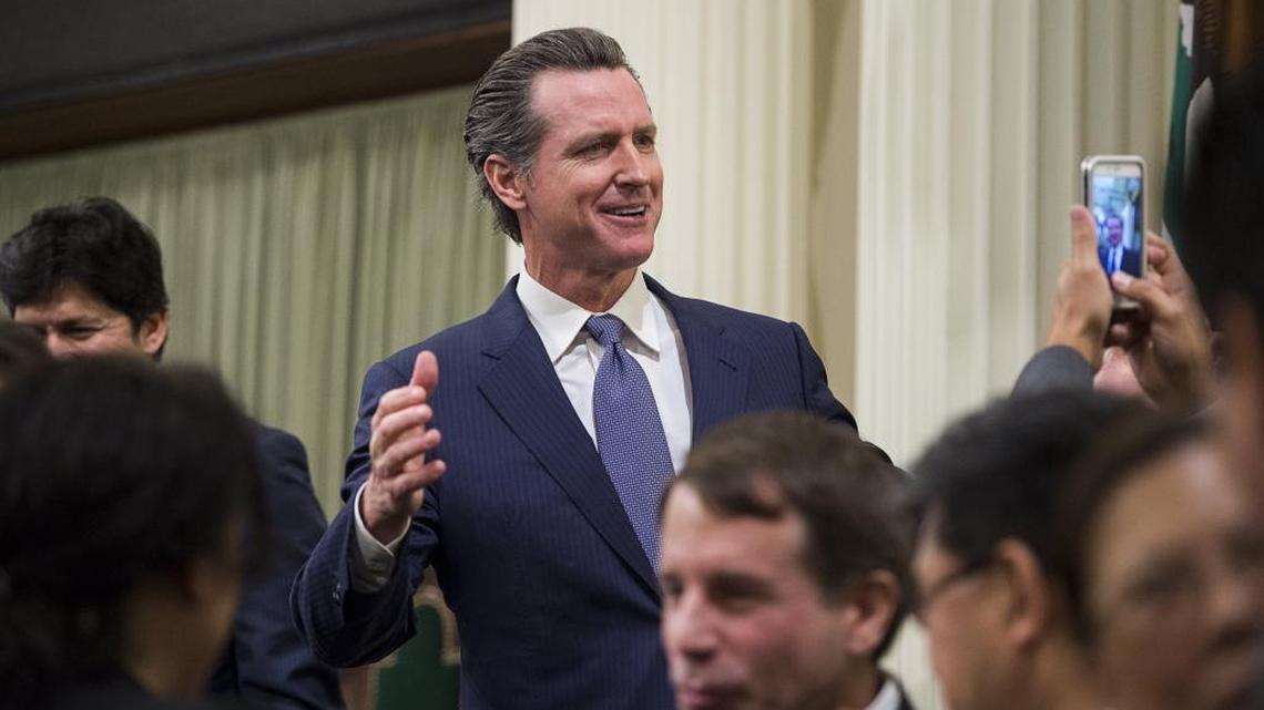 Lt. Gov. Gavin Newsom reacts after a photo taken before the State of the State address at the State Capitol on Thursday January 21, 2016 in Sacramento, Calif.