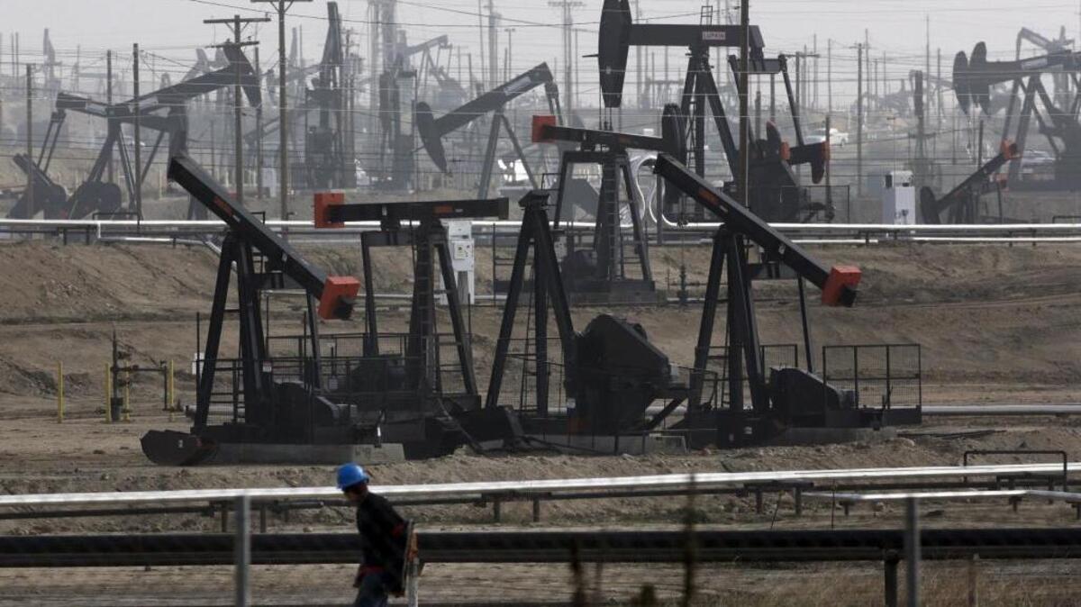This Jan. 16, 2015 file photo shows pumpjacks operating at the Kern River oil field near Bakersfield. Declining oil prices have resulted in a drop in Kern County’s taxable property values.