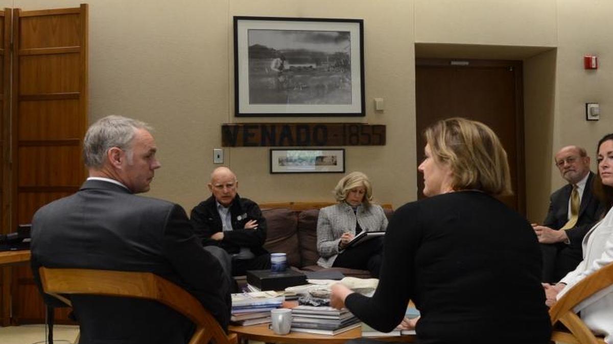 Interior Secretary Ryan Zinke , left, meets Gov. Jerry Brown in the Governor’s Office in Sacramento on Thursday. Brown’s executive secretary, Nancy McFadden, is sitting next to Brown on the couch.