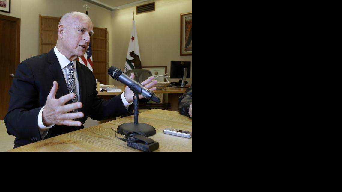 
Gov. Jerry Brown discusses his re-election while taking with reporters at his Capitol office on Nov. 5, 2014. New campaign-finance reports show that the governor’s re-election campaign spent about $5.7 million, not counting contributions to his ballot-measure committee and others.
