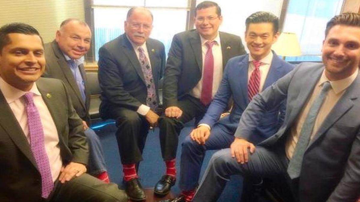
Democratic Assemblymen Miguel Santiago of Los Angeles, Freddie Rodriguez of Pomona, Jose Medina of Riverside, Rudy Salas of Bakersfield, Evan Low of Campbell and Ian Calderon of Whittier show off their CSU socks in this photo tweeted by Salas.
