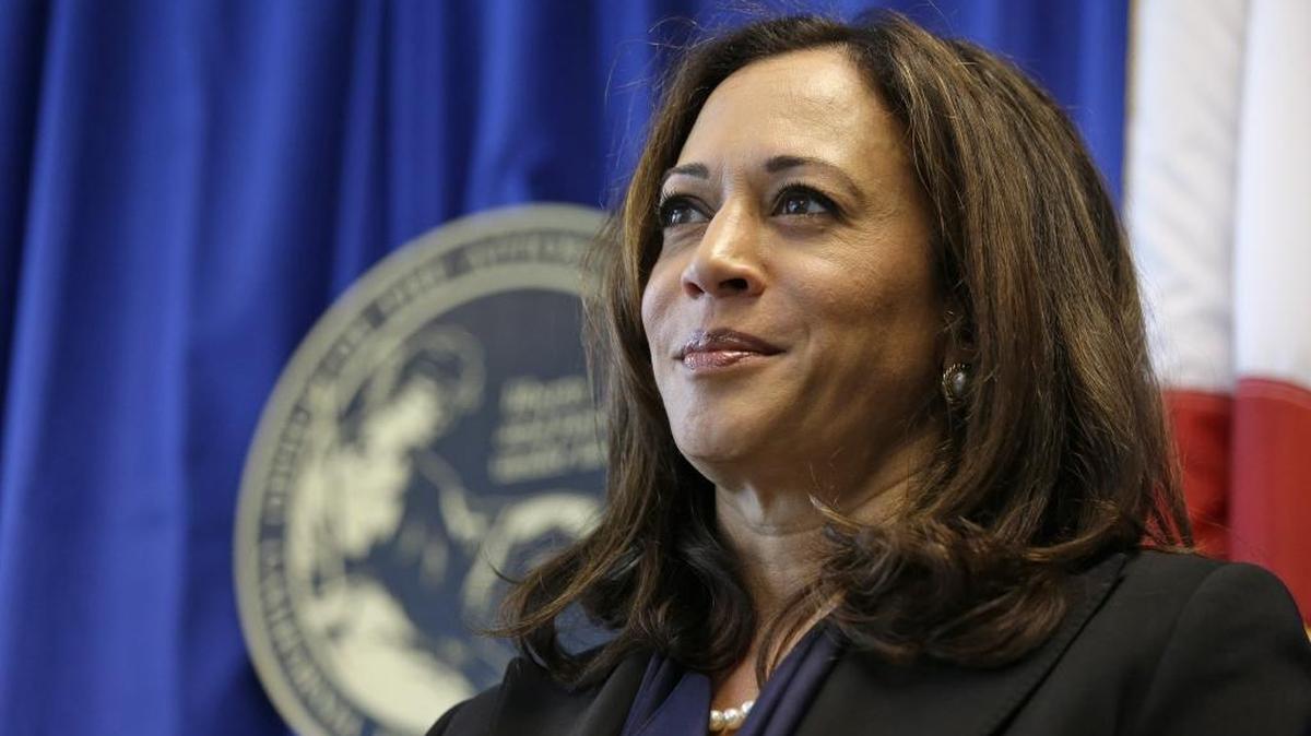California Attorney General Kamala Harris listens to questions about a settlement with Volkswagen during a news conference on June 28, 2016, in San Francisco.