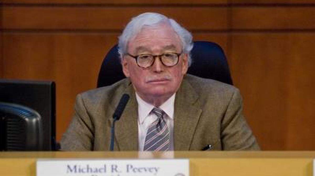 
In this Thursday, Oct. 25, 2012 file photo, Michael Peevey, the president of the California Public Utilities Commission, listens to a speaker at Irvine City Hall in Irvine, Calif.
