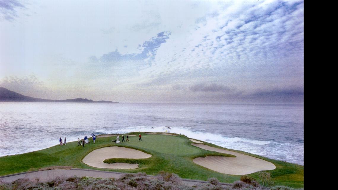 
Golfers walk off one of the greens at Pebble Beach during January's AT&T tournament.
