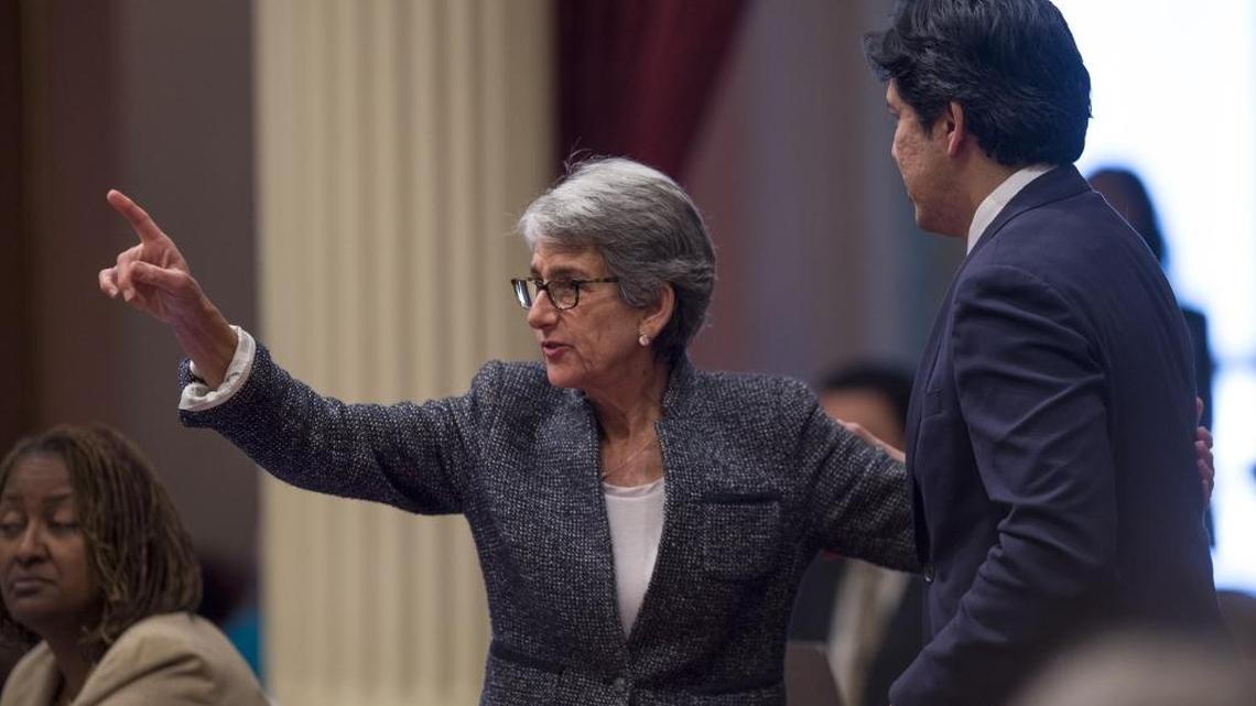 Senator Hannah-Beth Jackson, D-Santa Barbara, embraces Senate President Pro tem Kevin de León on the Senate Floor at the Capitol.