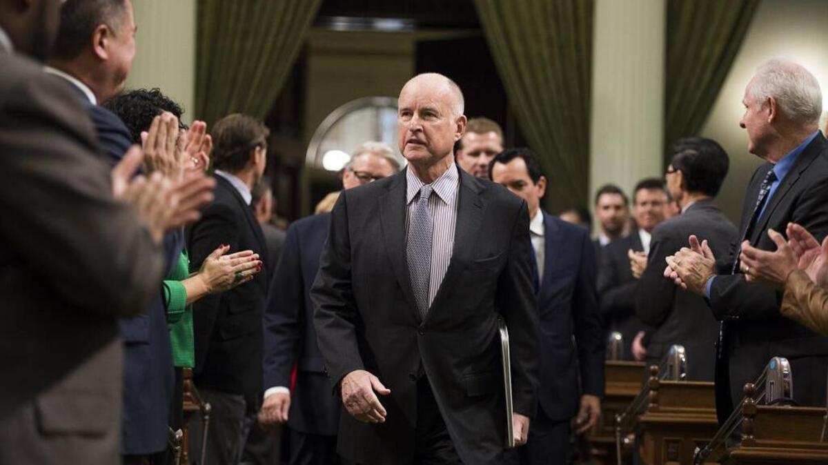 Gov. Jerry Brown arrives for the State of the State in the Assembly Chamber at the State Capitol on Jan. 21.