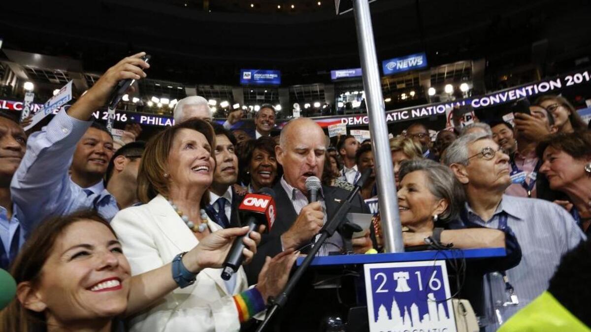 Members of the California delegation, including Rep. Nancy Pelosi, Gov. Jerry Brown, and Sen. Barbara Boxer, announce their votes for Hillary Clinton during the roll call at the Democratic National Convention on Tuesday, July 26, 2016.