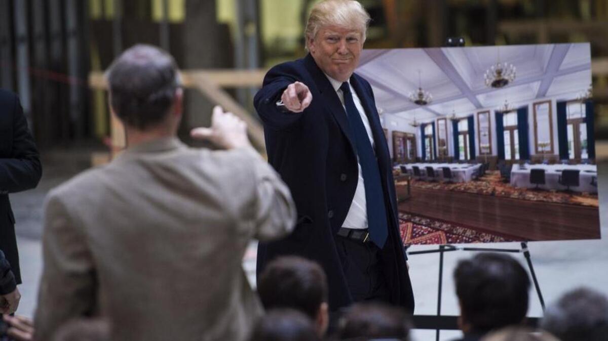 Republican presidential candidate Donald Trump walks out to speak during a campaign press conference at the Old Post Office Pavilion, soon to be a Trump International Hotel, in Washington on Monday.