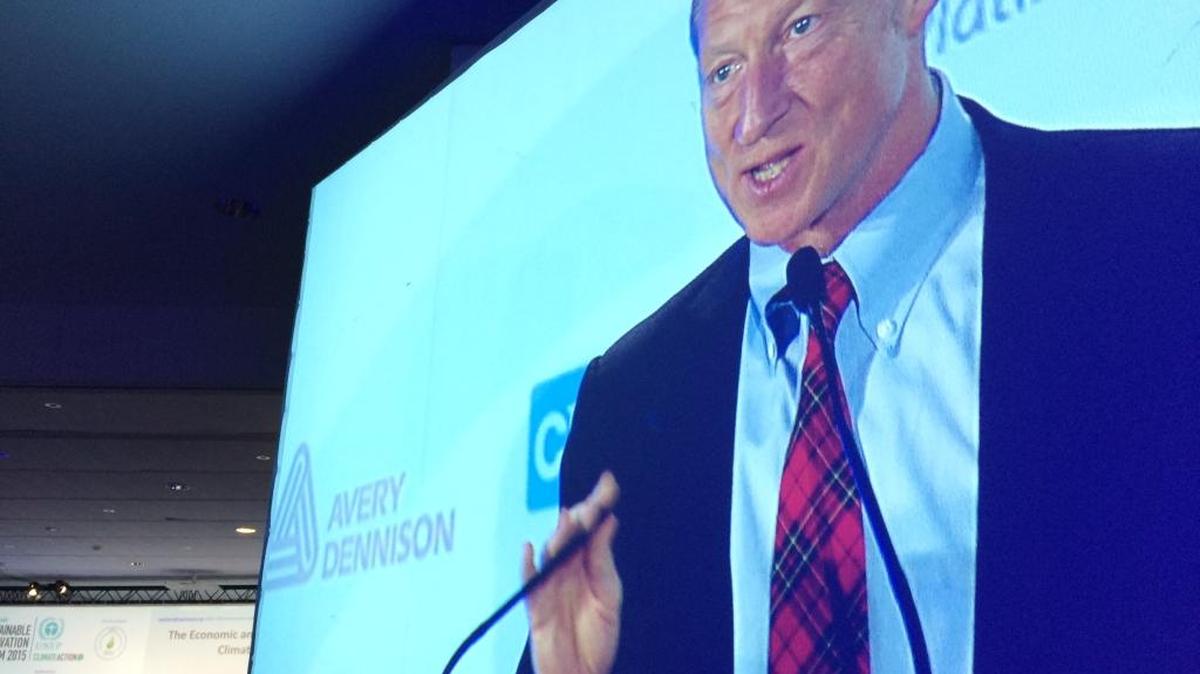 Billionaire environmentalist Tom Steyer addresses a crowd in Saint-Denis, Paris on Dec. 8, 2015.