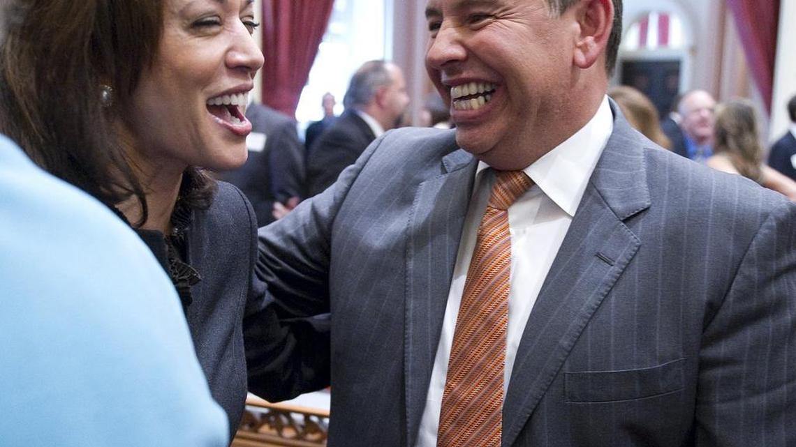 Attorney General Kamala Harris shares a laugh with former Lt. Gov. Abel Maldonado in the Senate chambers on Monday, January 10, 2011.
