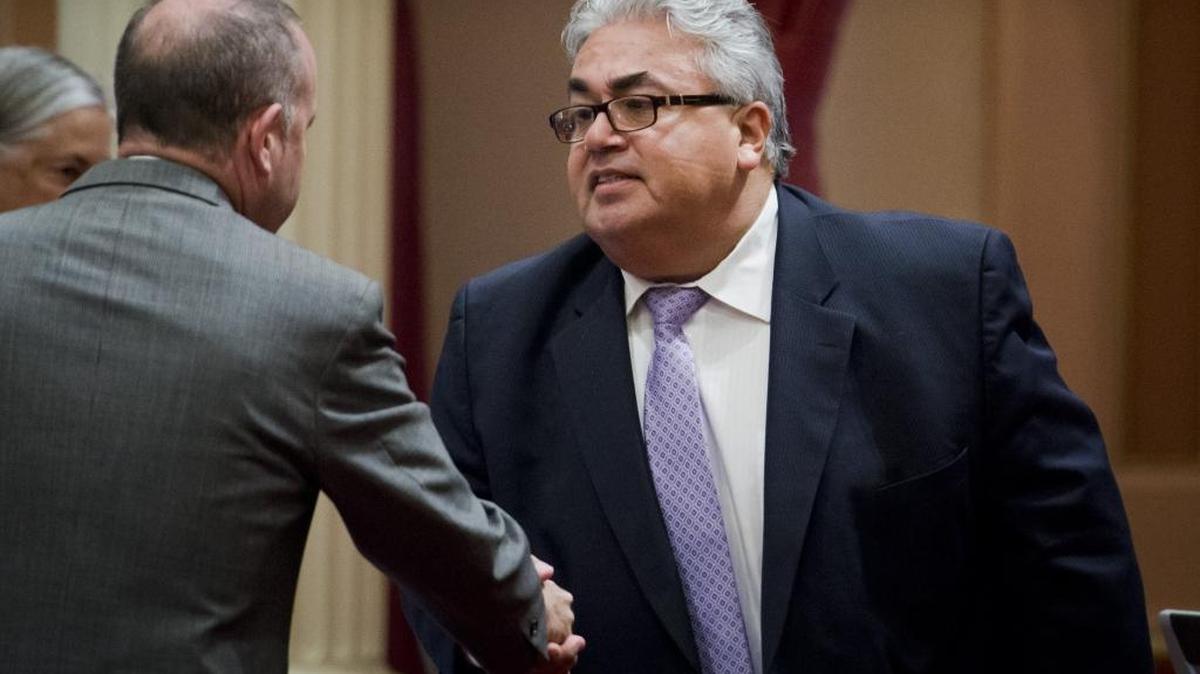 Sen. Ron Calderon, D-Montebello, shakes hand with then-Senate President Pro Tem Darrell Steinberg on June 10, 2013.