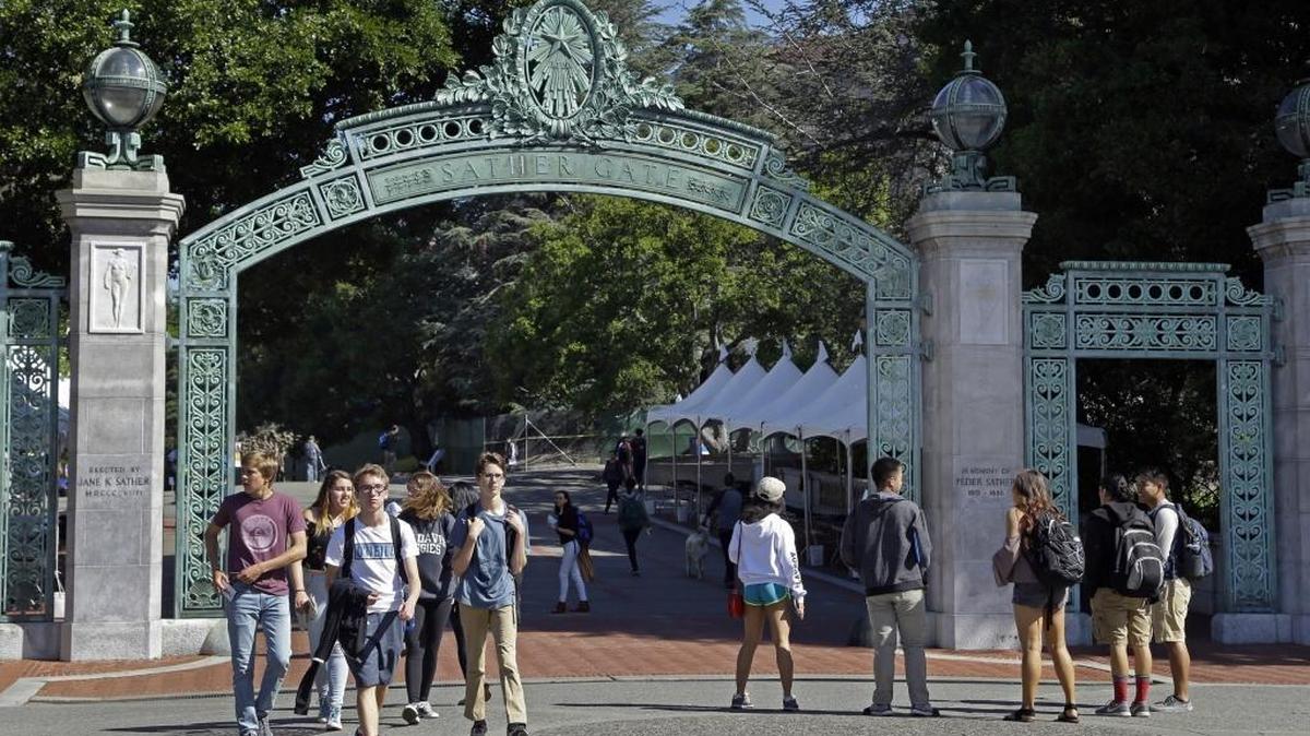 Students walk past Sather Gate on the University of California, Berkeley campus on April 21, 2017.