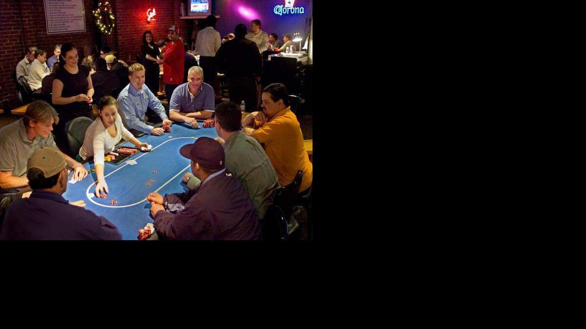
Patrons play Texas Hold-Em at The Limelight Card Room in Sacramento on Dec. 13, 2006.
