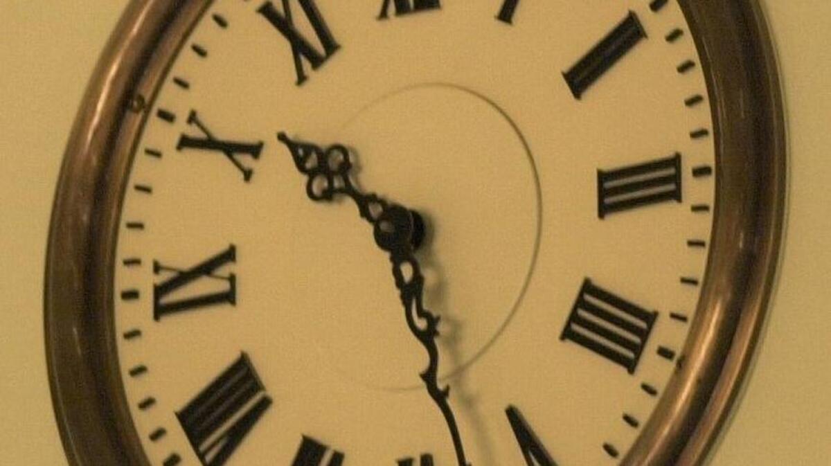 
The clock in the Assembly chamber ticks late into the night as lawmakers work hard to vote on lingering bills before the end of session Friday, September 13, 2001 at the stroke of midnight.
