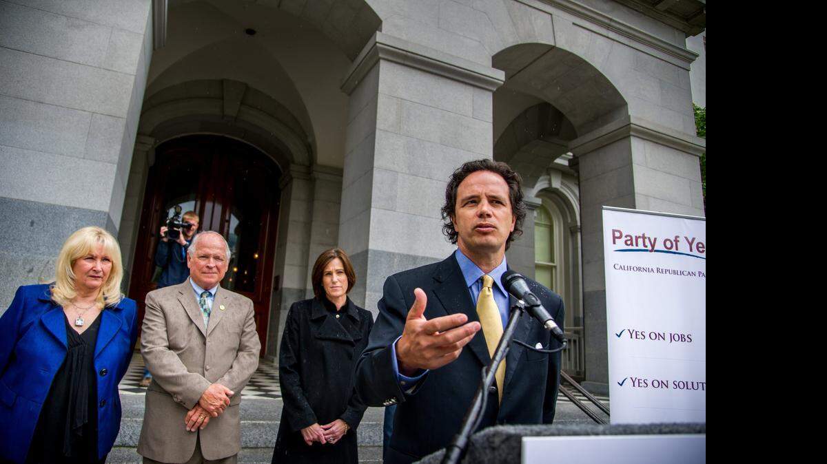 
Tom Del Beccaro, right, on the steps of the state Capitol in 2012, has announced his intention to run in the U.S. Senate race in 2016. The former chairman of the state Republican Party said he wants a flat tax and an end to the high-speed rail project.
