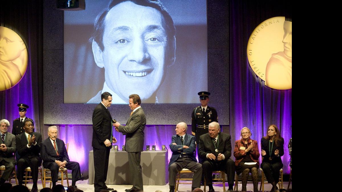 
Stuart Milk accepts the State Hall of Fame medal on behalf of his late uncle from Gov. Arnold Schwarzenegger as he was inducted with 12 other legendary Californians into The California Museum's California Hall of Fame on Tuesday, Dec. 1 2009.
