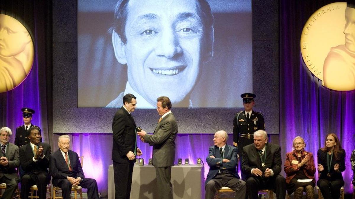 Stuart Milk accepts the State Hall of Fame medal on behalf of his late uncle Harvey Milk from Gov. Arnold Schwarzenegger in 2009 as he was inducted with 12 other legendary Californians into The California Museum’s California Hall of Fame.