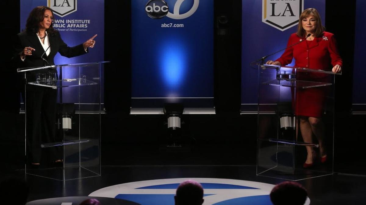 U.S. Senate candidate Kamala Harris, left, points a finger toward fellow candidate Loretta Sanchez during a debate in Los Angeles on Oct. 5, 2016.