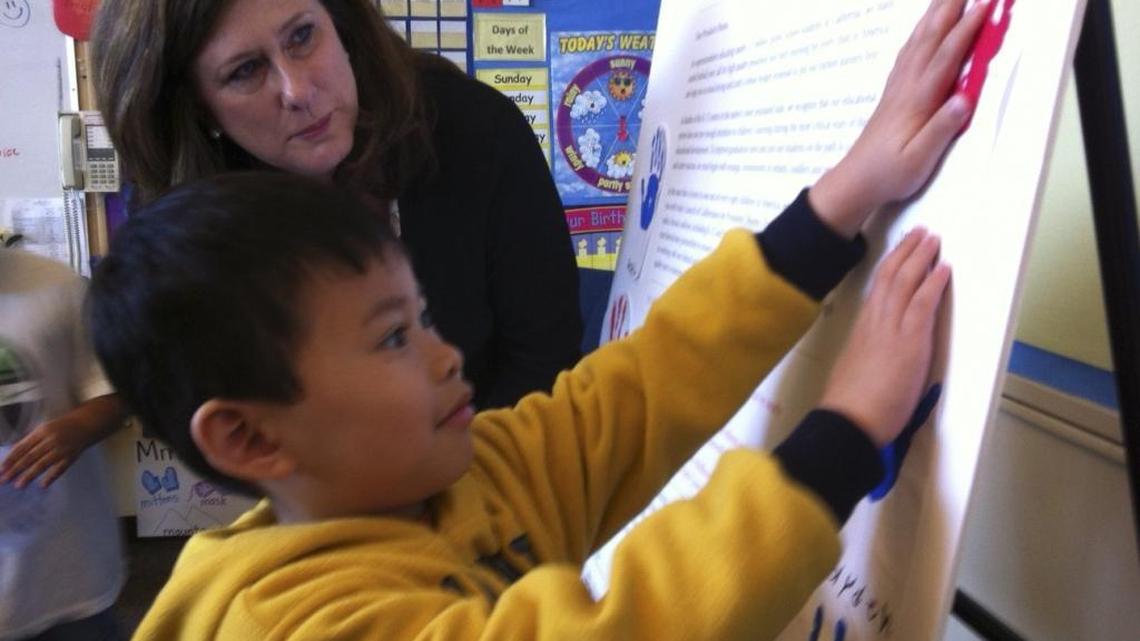 A pre-kindergarten student at H.W. Harkness Elementary School in Sacramento with Assemblywoman Susan Bonilla, D-Concord.