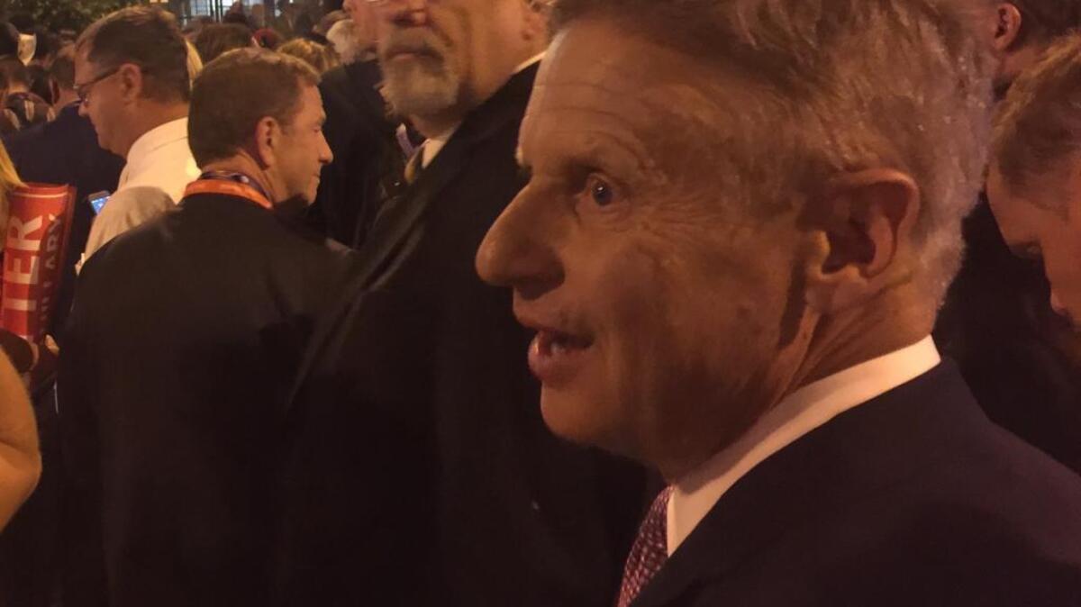 Gary Johnson, a Libertarian candidate for president, talks briefly about his support for marijuana legalization in California late Wednesday in Cleveland.