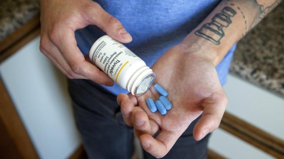 Adam Zeboski, an activist with the San Francisco AIDS Foundation, takes his dose of Truvada, a antiretroviral shown to prevent new HIV infections, in San Francisco, May 14, 2014.