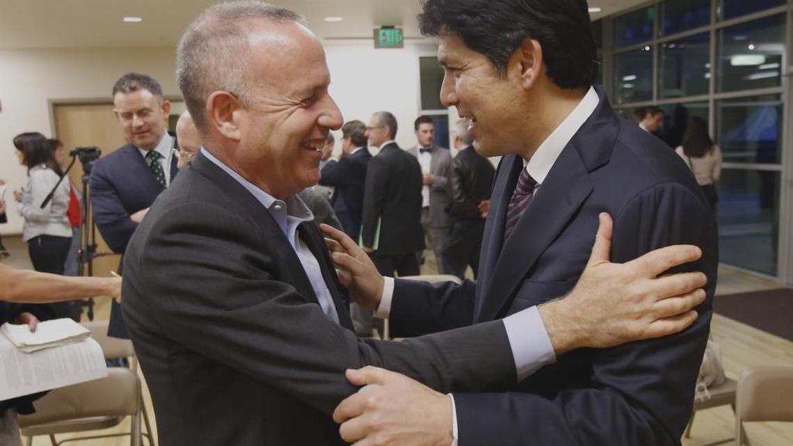 Senate President Pro Tem Kevin de Leon, D-Los Angeles, right, talks with former Senate leader Darrell Steinberg, D-Sacramento, after a news conference to announce a proposal to spend more than $2 billion to help the homeless Monday, Jan. 4, 2016, in Sacramento, Calif.