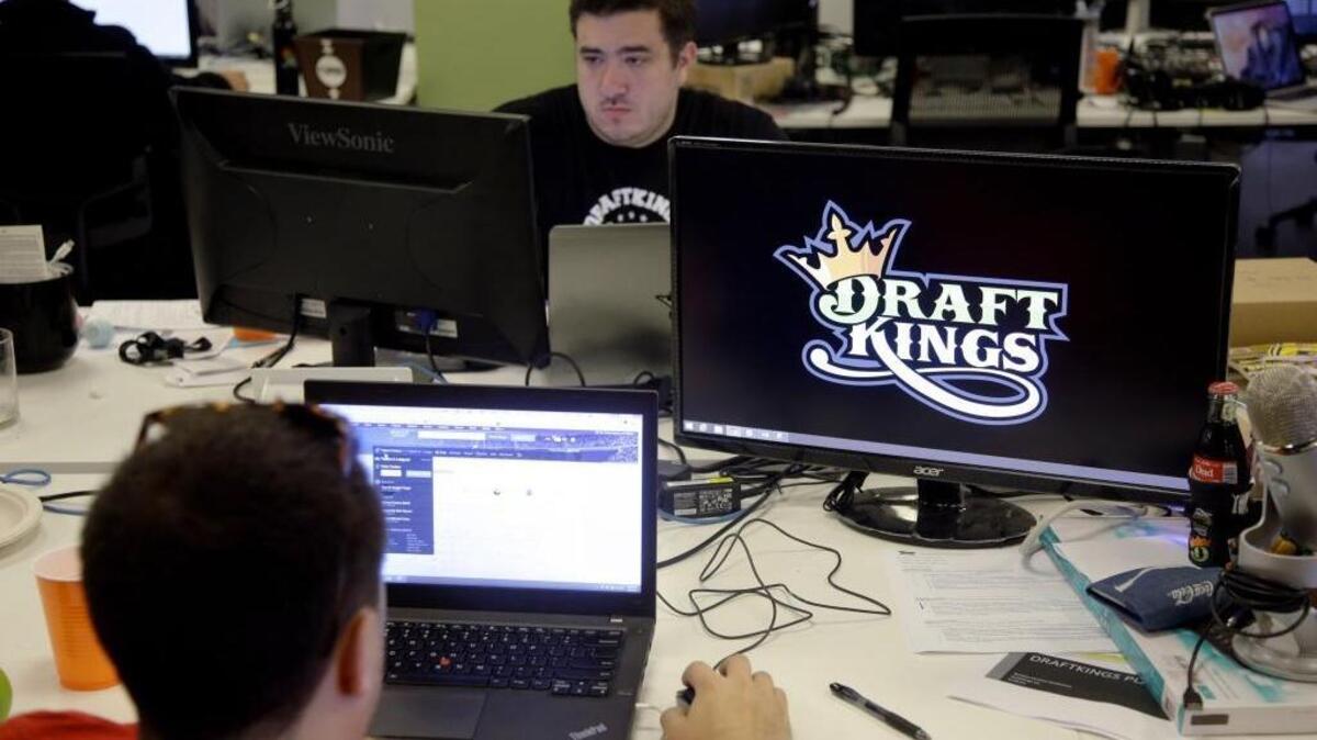 Len Don Diego, marketing manager for content at DraftKings, a daily fantasy sports company, works at his station at the company's offices in Boston.