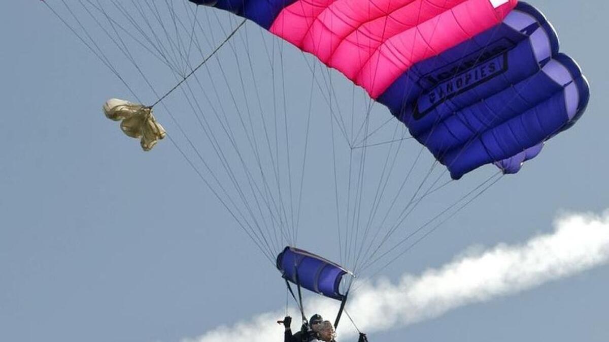 In this Feb. 14, 2010 file photo, Retired Col. Edward Gorre, 80, skydived at Lodi airport for his birthday. Jumping with him was retired military army paratrooper Fred Smith.