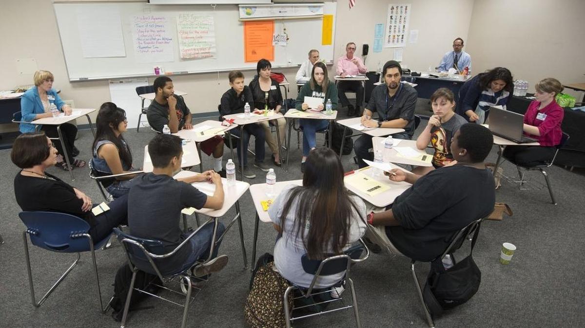 
Students, administrators, teachers and board members participate a "listening circle" at Mesa Verde High School on Wednesday, March 25, 2015, in Citrus Heights, Calif. A recent lawsuit contends that the recent state budget improperly manipulates the state’s school-funding guarantee.
