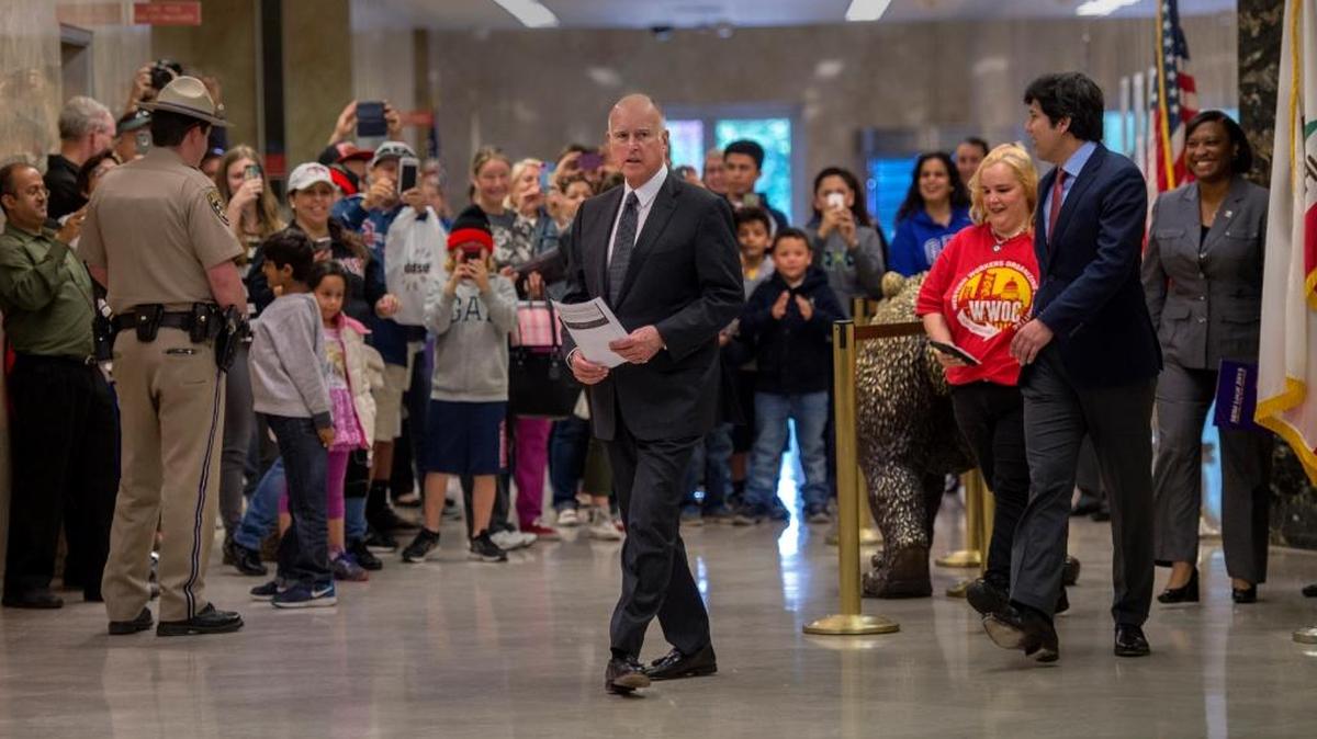 Gov. Jerry Brown joined legislators and labor leaders Monday in Sacramento to announce a landmark agreement that would make California the first state in the nation to commit to raising the minimum wage to $15 per hour statewide.