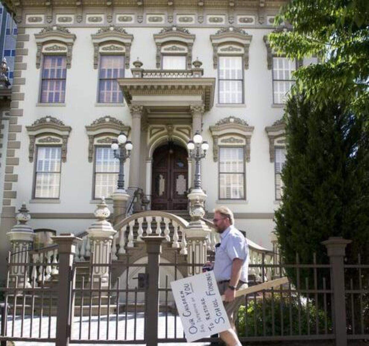 
Senate Democrats will hold their annual policy retreat at the Stanford Mansion in downtown Sacramento. Roseville teacher Jim Carpenter walked by for a protest at the Capitol on May 13, 2011.
