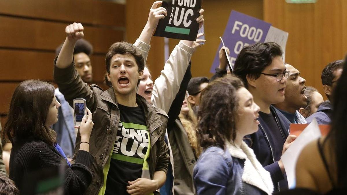 Students protest tuition hikes at a University of California board of regents meeting in San Francisco on Thursday, Nov. 17, 2016. Faced with record high enrollment and the need to hire faculty, the University of California and California State University systems are considering raising tuition for the first time in six years.