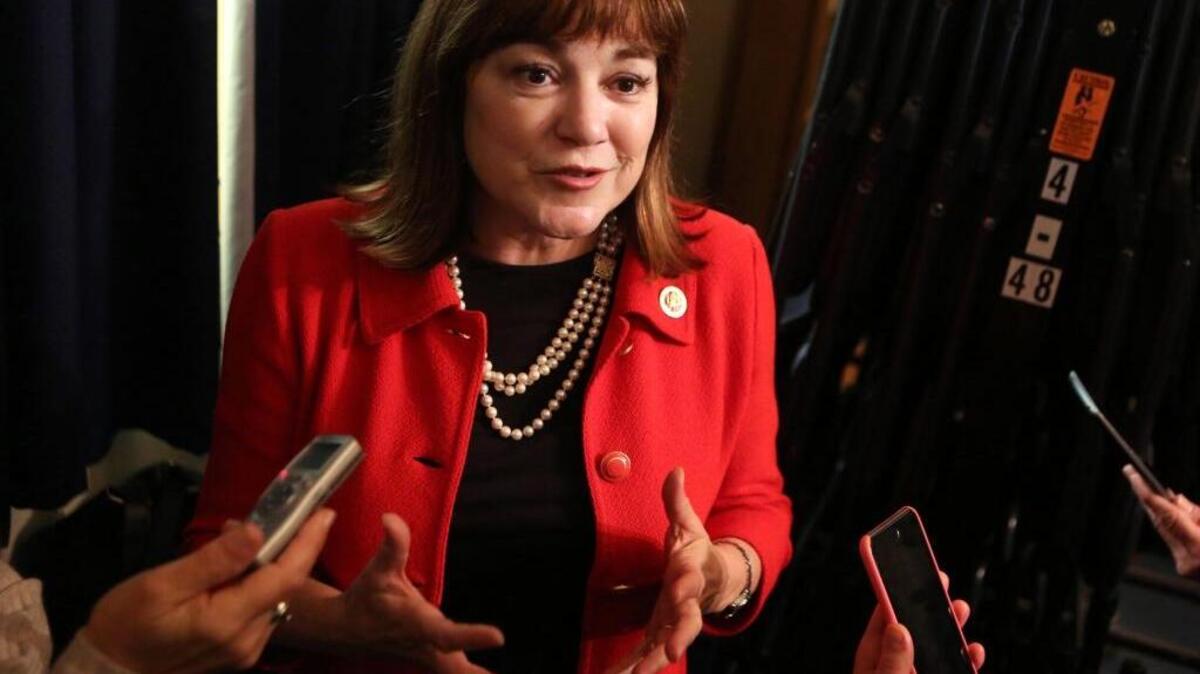 Rep. Loretta Sanchez, D-Orange, speaks with reporters last month after appearing at a forum hosted by the Latino Journal in Sacramento.