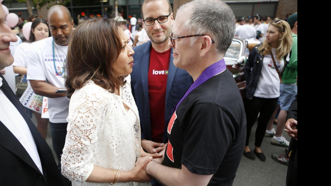 
Jim Obergefell embraces California Attorney General Kamala Harris during the San Francisco Pride Parade on Sunday in San Francisco, two days after the Supreme Court's landmark decision to require that states issue marriage licenses to same sex couples. Obergefell, the plaintiff in the Supreme Court case, began his legal battle for marriage equality so he would be recognized as legally married to his late husband, John Arthur.
