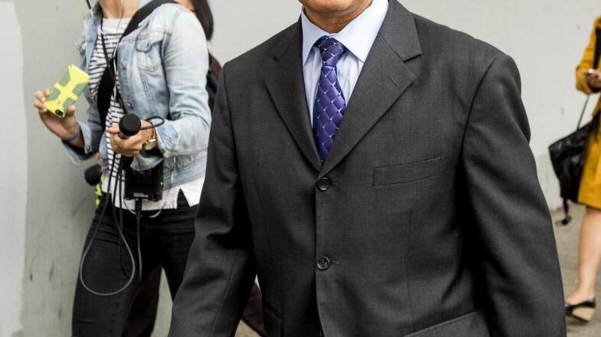 Former California state Sen. Leland Yee leaves federal court in San Francisco on July 31, 2014.