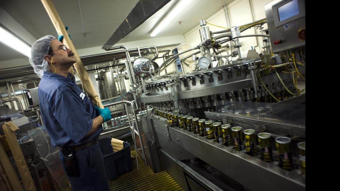 
Craig Ruth a filler operator gets ready to load tops that will go on cans of a Go Girl drink made for women. NorCal Beverage Co. Inc. was founded in 1937 and is based in West Sacramento. Photo taken Feb. 15, 2011.
