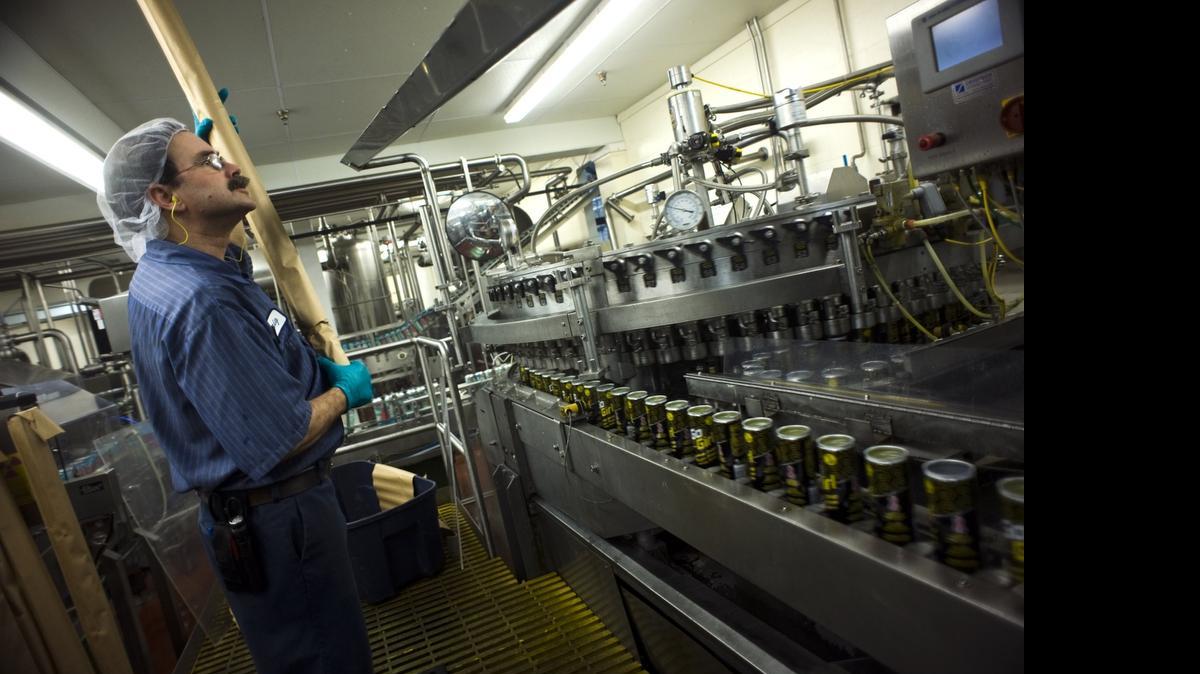 
Craig Ruth a filler operator gets ready to load tops that will go on cans of a Go Girl drink made for women. NorCal Beverage Co. Inc. was founded in 1937 and is based in West Sacramento. Photo taken Feb. 15, 2011.
