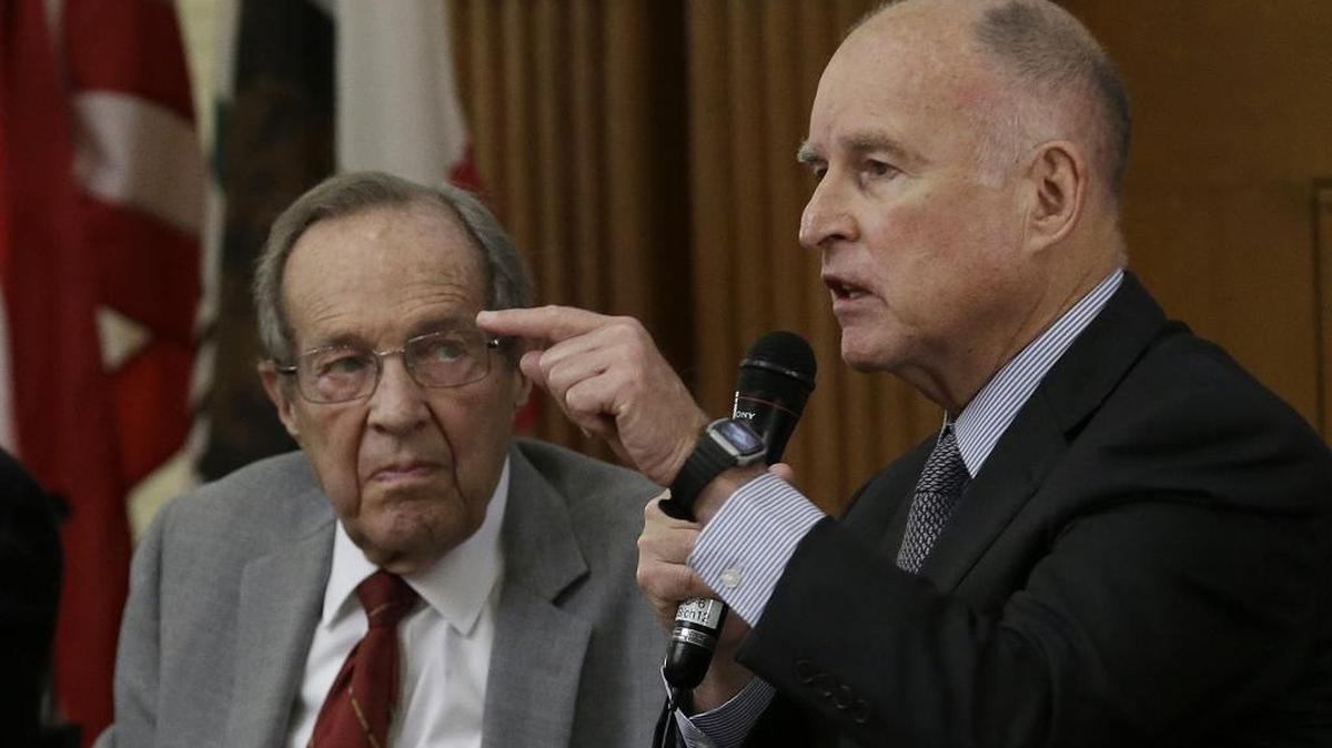 Gov. Jerry Brown, right, speaks next to former U.S. Secretary of Defense William Perry at an event Tuesday at Stanford University.