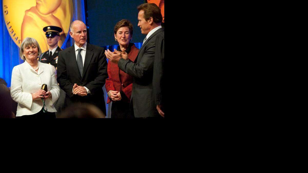 
Then-Gov. Arnold Schwarzenegger, far right, meets with, from left, Cynthia Kelly, Gov.-elect Jerry Brown and Kathleen Brown at the 2010 California Hall of Fame ceremony in Sacramento.
