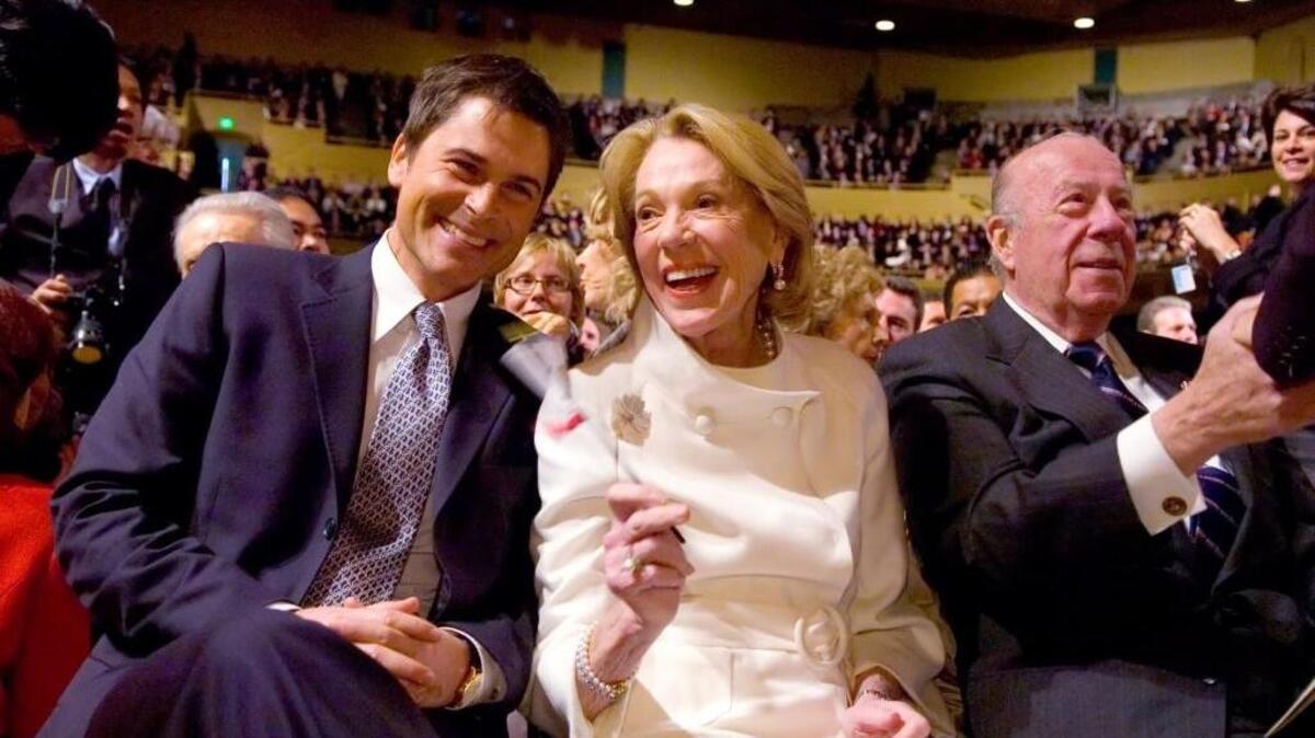 Actor Rob Lowe sits with former Secretary of State George Shultz, right, and Schultz’s wife, Charlotte, during the inauguration of California Gov. Arnold Swarzenegger for a second term in Sacramento in 2007. A state tax board recently issued a decision in a Lowe tax appeal.