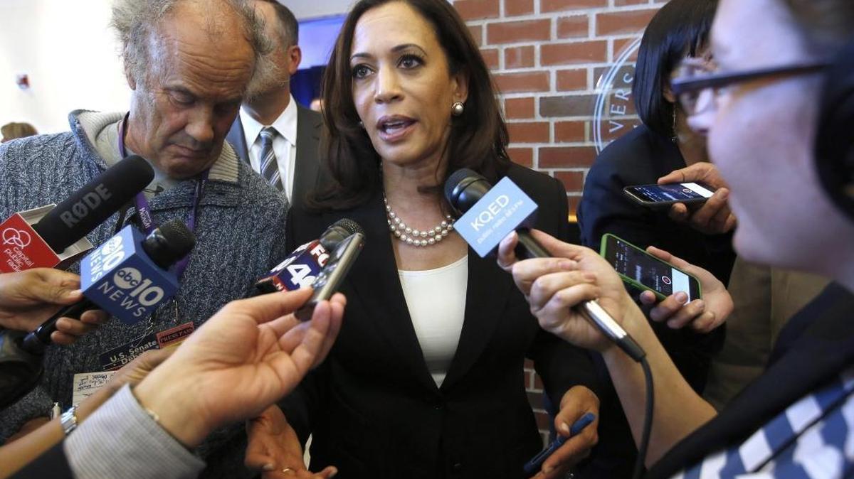 California Attorney General Kamala Harris talks with reporters after a U.S. Senate debate at the University of the Pacific, April 25, 2016, in Stockton.