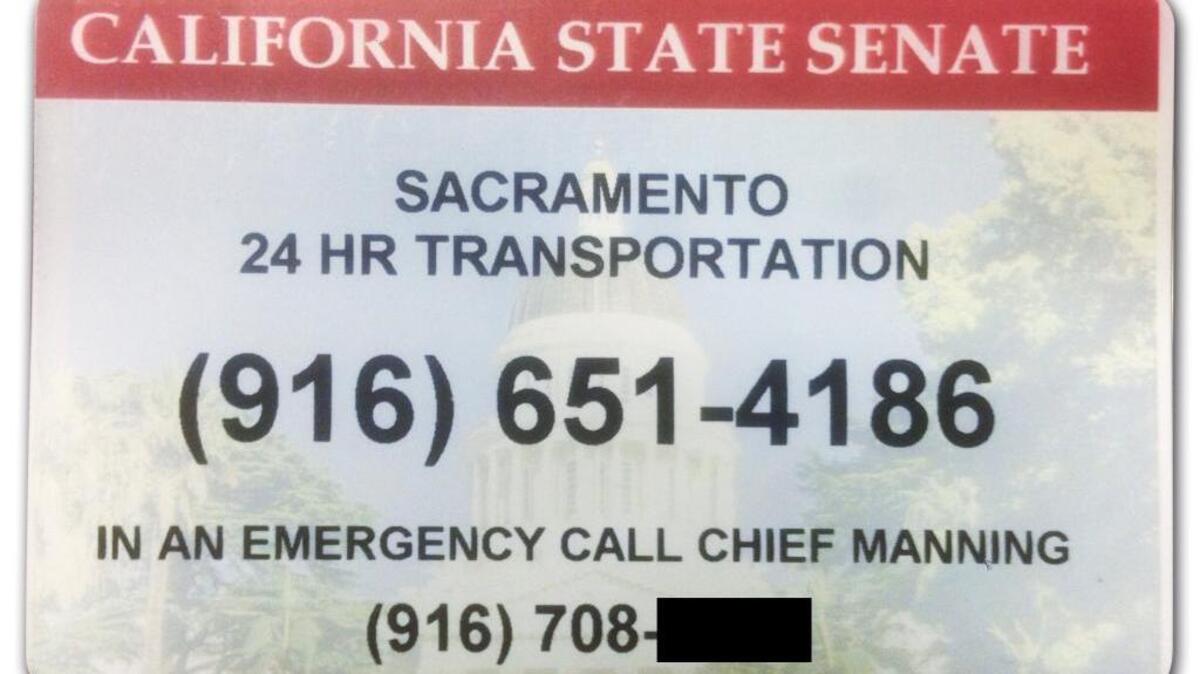 
Senate members were given small plastic cards with the phone numbers for “Sacramento 24 hr transportation” and Chief Sergeant-at-Arms Debbie Manning, whose number has been obscured by The Bee.
