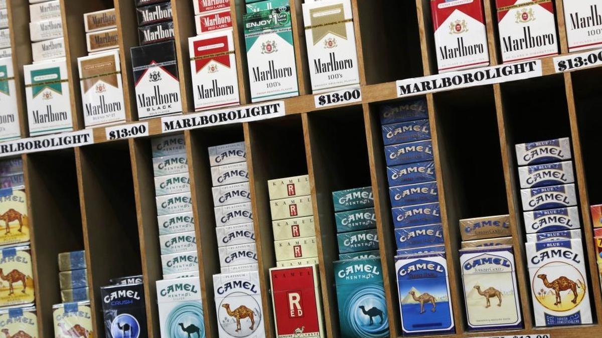Cigarette packs are displayed at a convenience store in New York on March 18, 2013.