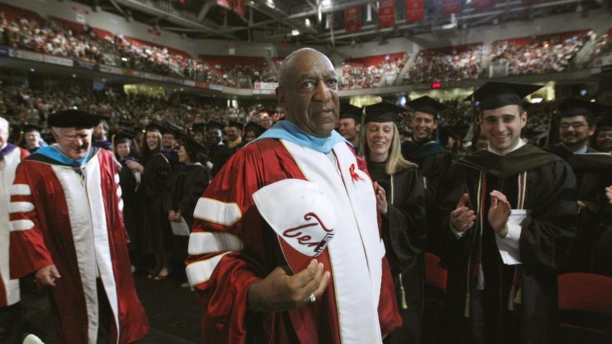 In this May 12, 2011 file photo, comedian Bill Cosby appears at Temple University's commencement in Philadelphia. The California State University system this week revoked an honorary degree to Cosby.