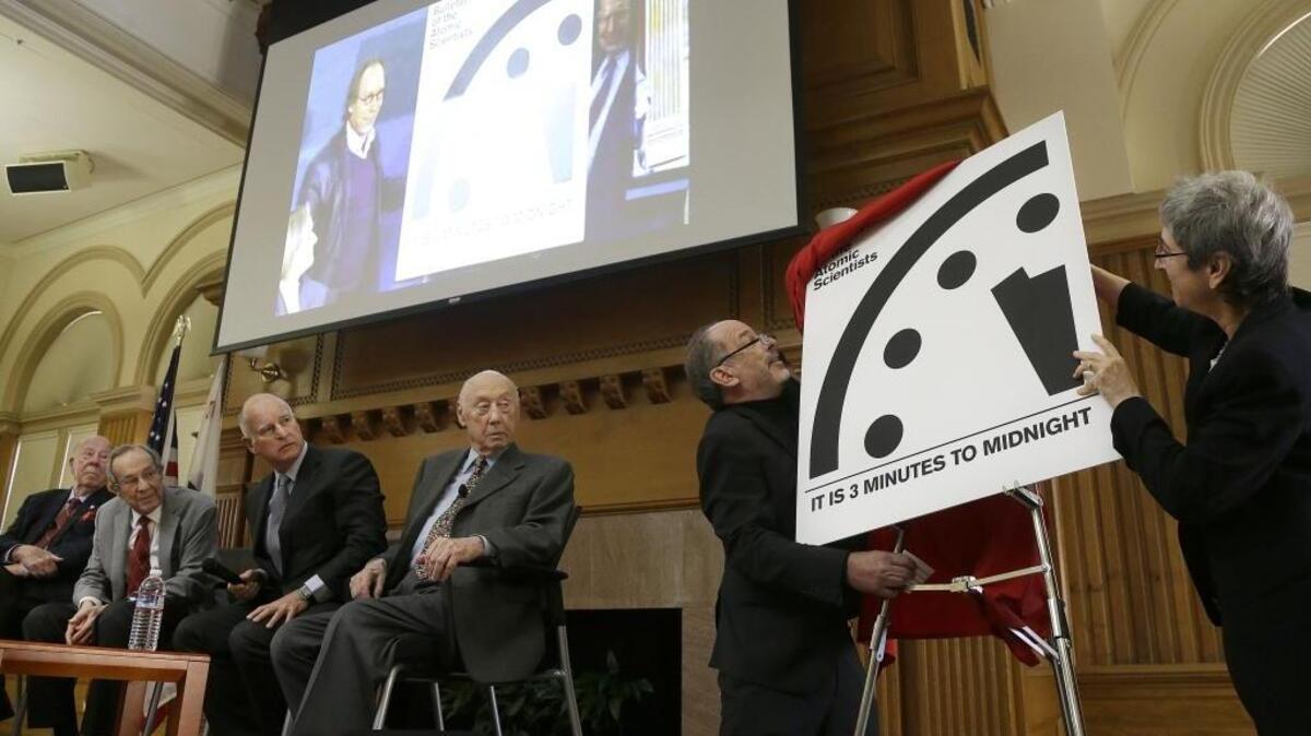 Gov. Jerry Brown, third from left, attended the Bulletin of the Atomic Scientists’ unveiling of the “Doomsday Clock” at Stanford University on Jan. 26, 2016.